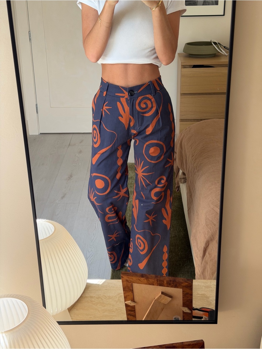 Navy Wide-Leg Trousers with Rust Graphic Print